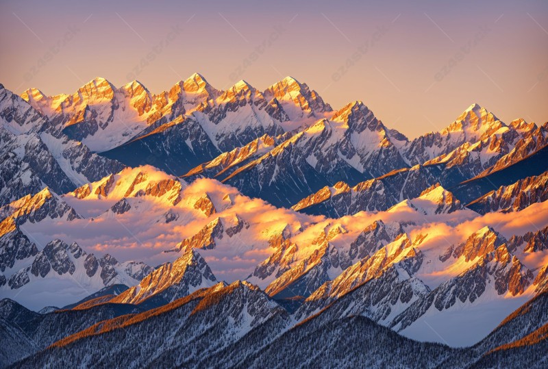 Sunset over a snowy mountain range  06